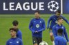 Barcelona's Robert Lewandowski, centre, smiles during a training at the San Siro stadium in Milan, Italy, Monday, May 5, 2025, ahead of the Champions League semifinals second leg soccer match between Inter Milan and Barcelona on Tuesday. (AP Photo/Antonio Calanni)