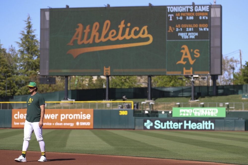 Athletics top prospect Nick Kurtz stands during warmups of a baseball game against the Texas Rangers Tuesday, April 22, 2025, in West Sacramento, Calif. (AP Photo/Scott Marshall)