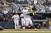 Athletics' Luis Urías (17) hits a walk-off home run during the 10th inning of a baseball game against the Chicago White Sox, Sunday, April 27, 2025, in West Sacramento, Calif. (AP Photo/Sara Nevis)