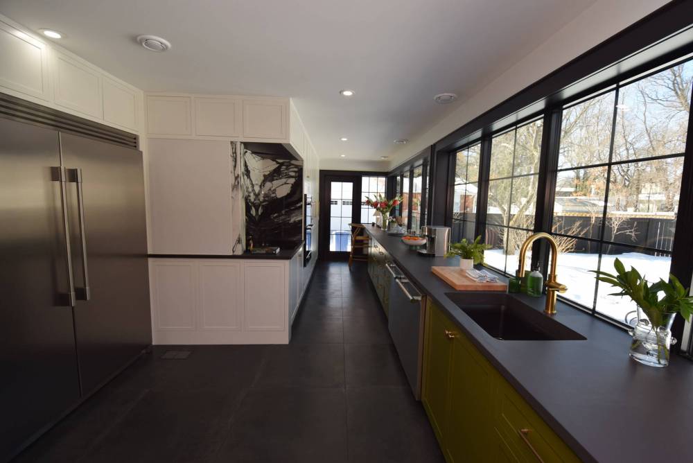 TODD LEWYS / FREE PRESS
Resident chefs will love the incredible butler’s pantry, which offers all kinds of space to create — while getting a fabulous view of the tree-lined backyard.