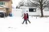 MIKAELA MACKENZIE / FREE PRESS 	 Liberal candidate for Winnipeg West Doug Eyolfson (left) and campaign crew member Jon Gerrard door-knock in the riding on Friday, March 28, 2025. For Malak story. Winnipeg Free Press 2025