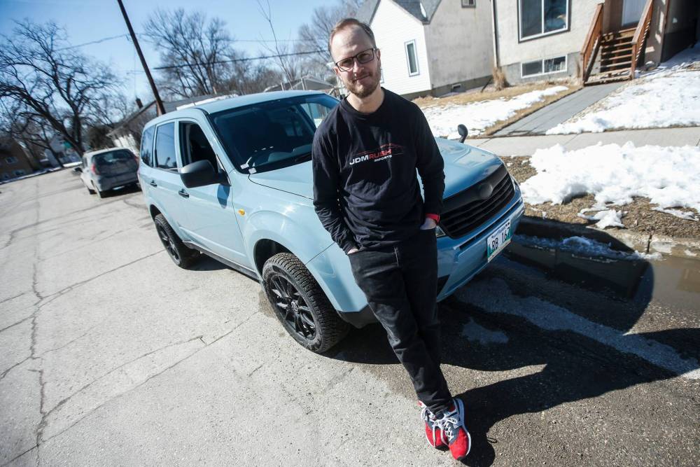 JOHN WOODS / FREE PRESS
Adam Duguay, owner of JDM Rush Imports, which imports vehicles from Japan, is photographed with a right-hand drive 2008 Subaru Forester XT he recently brought to Winnipeg.