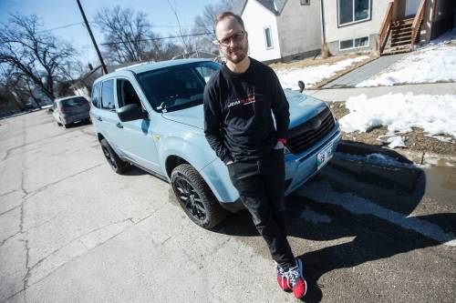 JOHN WOODS / FREE PRESS
                                Adam Duguay, owner of JDM Rush Imports, which imports vehicles from Japan, is photographed with a right-hand drive 2008 Subaru Forester XT he recently brought to Winnipeg.