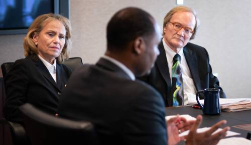 GLEN STUBBE / MINNESOTA STAR TRIBUNE
                                Judges Susan Richard Nelson and Donovan Frank listened as U.S. Probation Officer Reggie Hall discussed a case as the group gathered for a preliminary meeting with probation staff, prosecutors, federal defenders and mentors before they all begin the week&rsquo;s session of re-entry court on Aug. 22, 2018. NOTE: ONE TIME USE. FOR THIS STORY ONLY