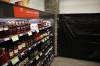 Canadian whisky is advertised at a Liquor Mart in March while black plastic covers the American whiskey section. (Tim Smith/The Brandon Sun files)