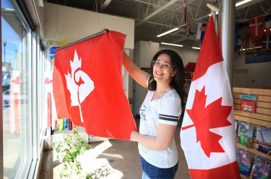 Samantha Hobson‘s husband, Mathew, recently designed the Elbows Up flag that they have displayed in the window of their business, The Flag Shop, located on Osborne Street. (Ruth Bonneville / Free Press)