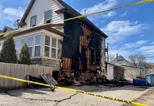 MAGGIE MACINTOSH/FREE PRESS
                                546 Home St. caught fire and suffered significant damage following an unusual police chase and related explosion in the West End on Friday.