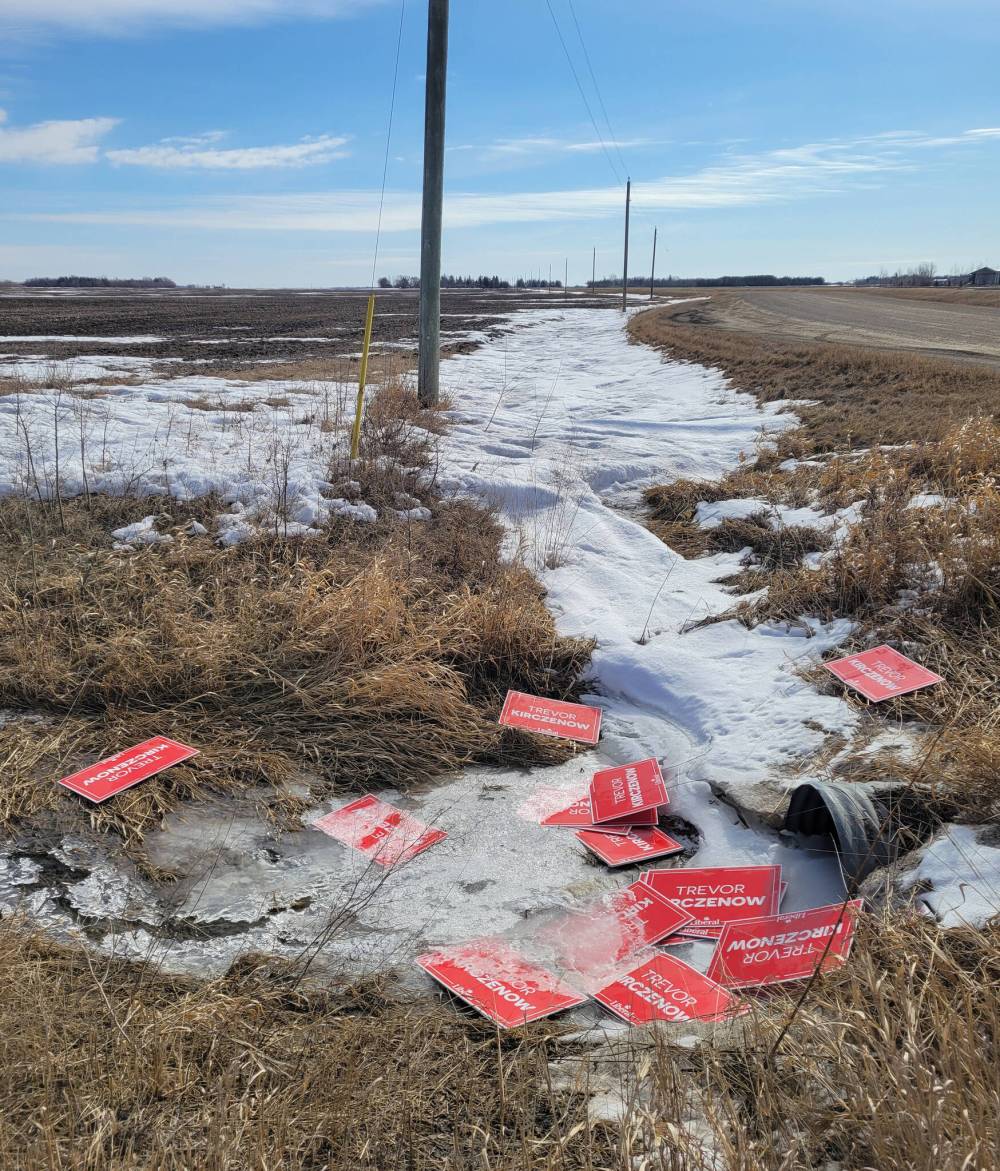 SUPPLIED
Signs for Liberal candidate Trevor Kirczenow found strewn in a ditch along the Trans-Canada Highway.