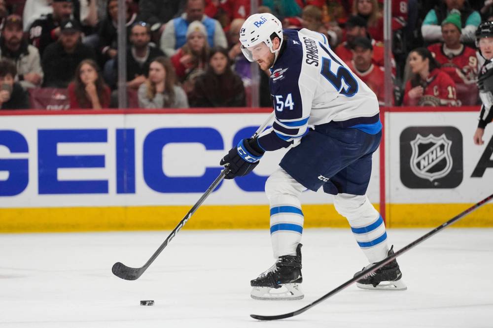 ERIN HOOLEY / THE ASSOCIATED PRESS
Winnipeg Jets defenceman Dylan Samberg was on the ice as a full-time participant in Tuesday’s practice, despite leaving Sunday’s game against the Edmonton Oilers after blocking a one-timer from Connor McDavid.