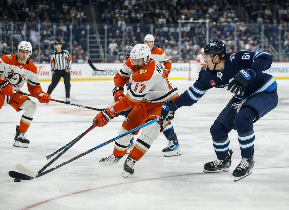 John Woods / THE CANADIAN PRESS
Winnipeg Jets’ Logan Stanley defends against Anaheim Ducks’ Alex Killorn during the first period.