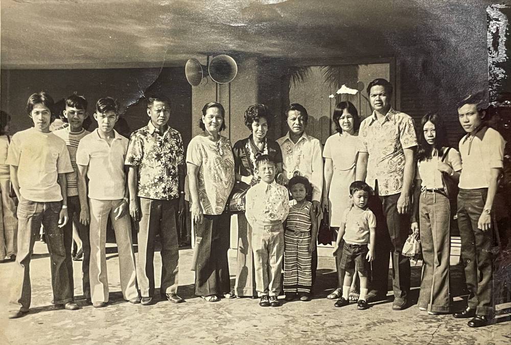 Supplied
Socorro and Neme Juan and their children (centre) as they prepare to leave the Philippines for Canada in 1974.