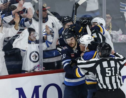 John Woods / THE CANADIAN PRESS
                                Winnipeg Jets and St. Louis Blues players fight at the end of the third period in Winnipeg on Saturday.