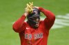 Boston Red Sox's Jarren Duran reacts after stealing home against the Cleveland Guardians during the third inning of the second baseball game of a doubleheader, Saturday, April 26, 2025, in Cleveland, (AP Photo/David Richard)