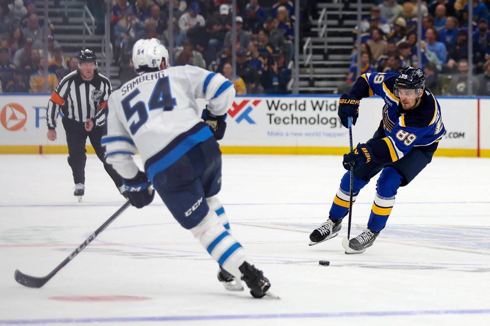 Scott Kane / The Associated Press
Pavel Buchnevich (right) had three goals and one assist in the Blues’ victory over the Jets Thursday night.