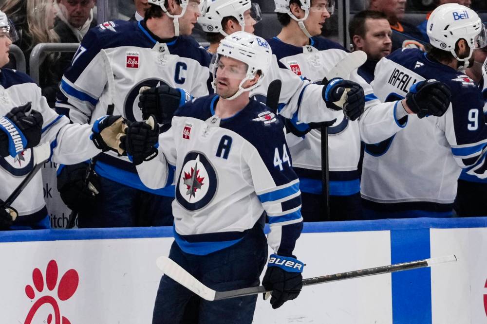 Frank Franklin II / The Associated Press files
Winnipeg Jets’ Josh Morrissey (centre) expects the Jets to bounce back after their Game 3 loss to the St. Louis Blues on Thursday on account of the team’s resiliency through the regular season.