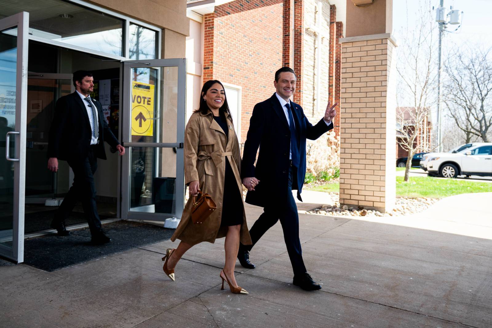 SPENCER COLBY / THE CANADIAN PRESS
                                Conservative Party Leader Pierre Poilievre, right, and his wife Anaida Poilievre depart a polling station after voting in Ottawa on Monday.
