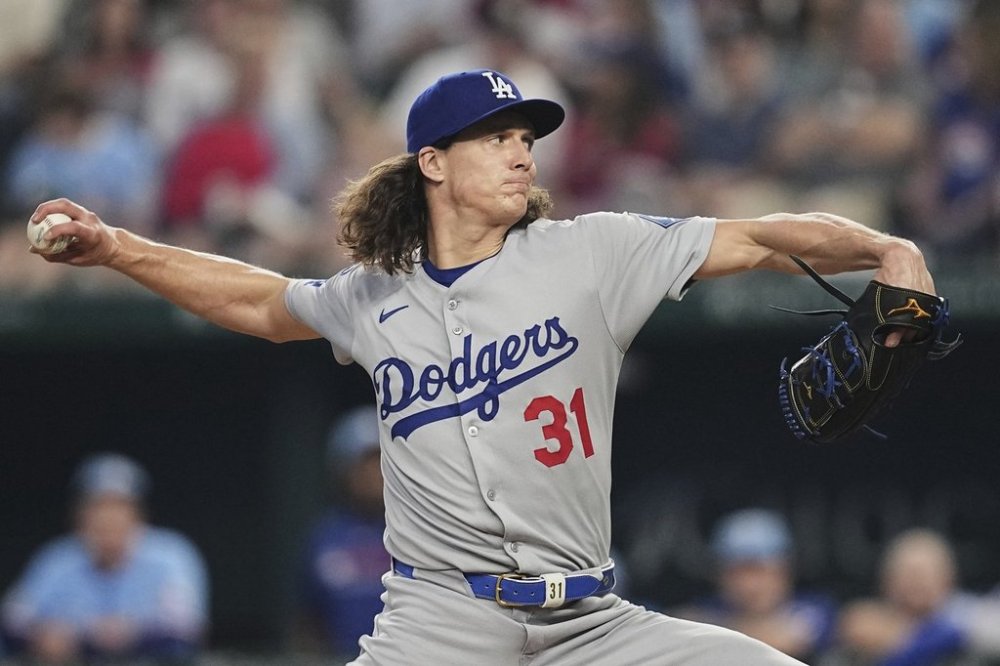 Los Angeles Dodgers starting pitcher Tyler Glasnow throws to the Texas Rangers in the second inning of a baseball game in Arlington, Texas, Sunday, April 20, 2025. (AP Photo/Tony Gutierrez)