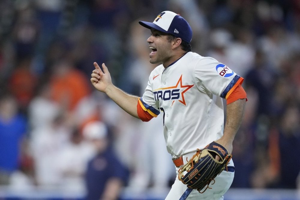 Houston Astros left fielder Jose Altuve celebrates after a baseball game against the Los Angeles Angels, Sunday, April 13, 2025, in Houston. (AP Photo/Kevin M. Cox)