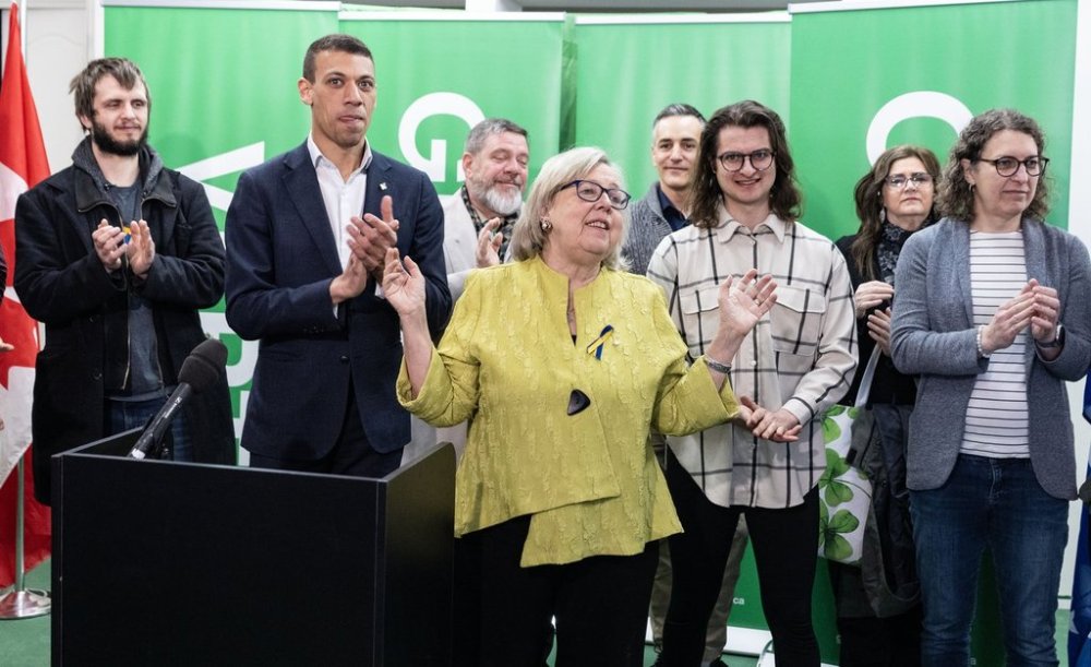 The Green Party of Canada co-leaders Elizabeth May, centre, and Jonathan Pedneault, left, introduce their candidates as they launch their election campaign in Montreal, Sunday, March 23, 2025. THE CANADIAN PRESS/Christinne Muschi