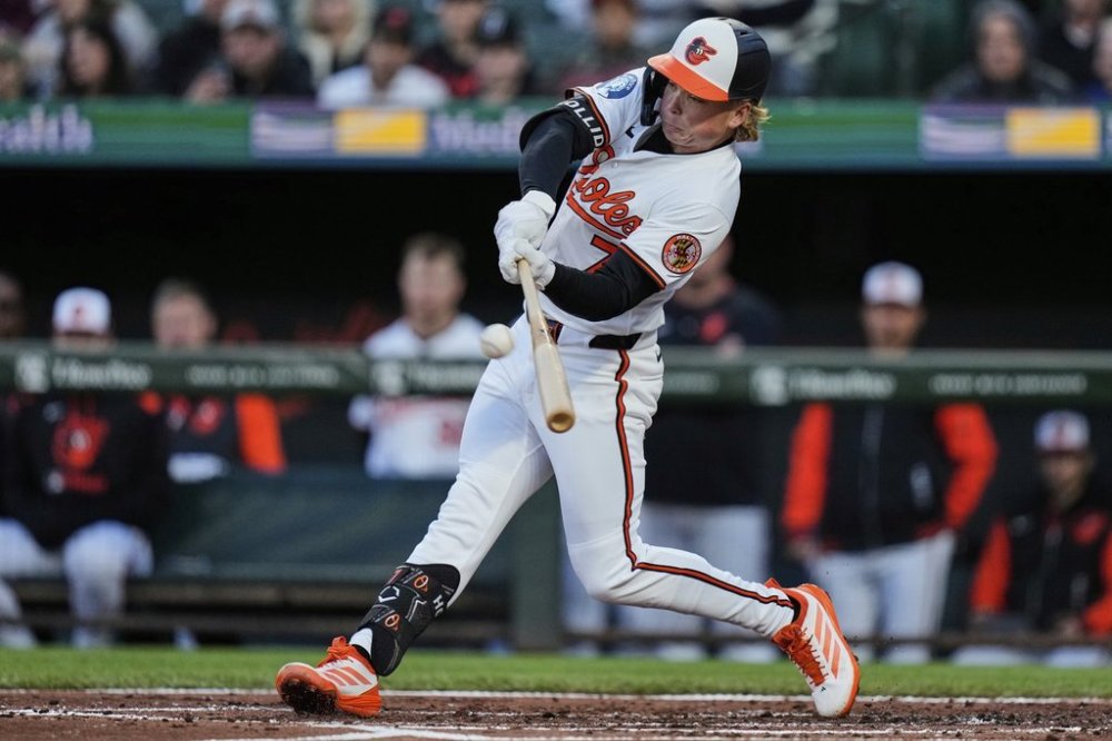 Baltimore Orioles' Jackson Holliday hits a grand slam during the second inning of a baseball game against the Cleveland Guardians, Wednesday, April 16, 2025, in Baltimore. (AP Photo/Stephanie Scarbrough)