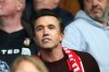 Wrexham co-owner Rob McElhenney in the away stand before the League One soccer match between Blackpool and Wrexham at Bloomfield Road, Blackpool, England, Monday April 21, 2025. (Richard Sellers/PA via AP)