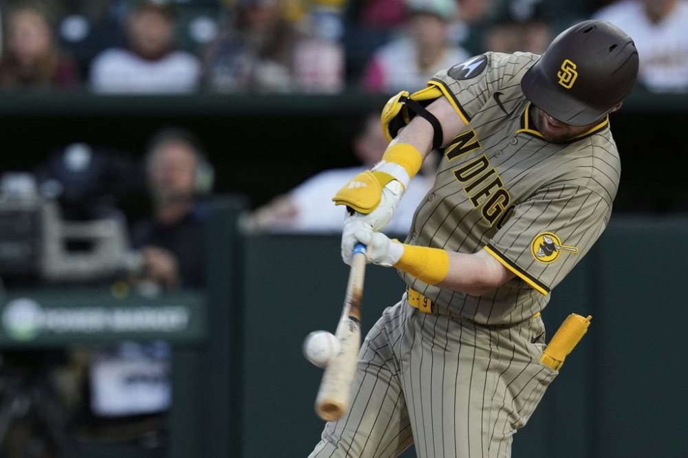 San Diego Padres' Jake Cronenworth hits a two-run home run during the first inning of a baseball game against the Athletics, Monday, April 7, 2025, in West Sacramento, Calif. (AP Photo/Godofredo A. Vásquez)