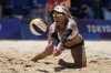 FILE - April Ross, of the United States, dives for the ball during a women's beach volleyball Gold Medal match against Australia at the 2020 Summer Olympics, Friday, Aug. 6, 2021, in Tokyo, Japan. (AP Photo/Felipe Dana, File)