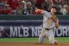 San Francisco Giants third baseman Matt Chapman throws the ball to first base during the ninth inning of a baseball game against the Los Angeles Angels in Anaheim, Calif., Saturday, April 19, 2025. (AP Photo/Jessie Alcheh)