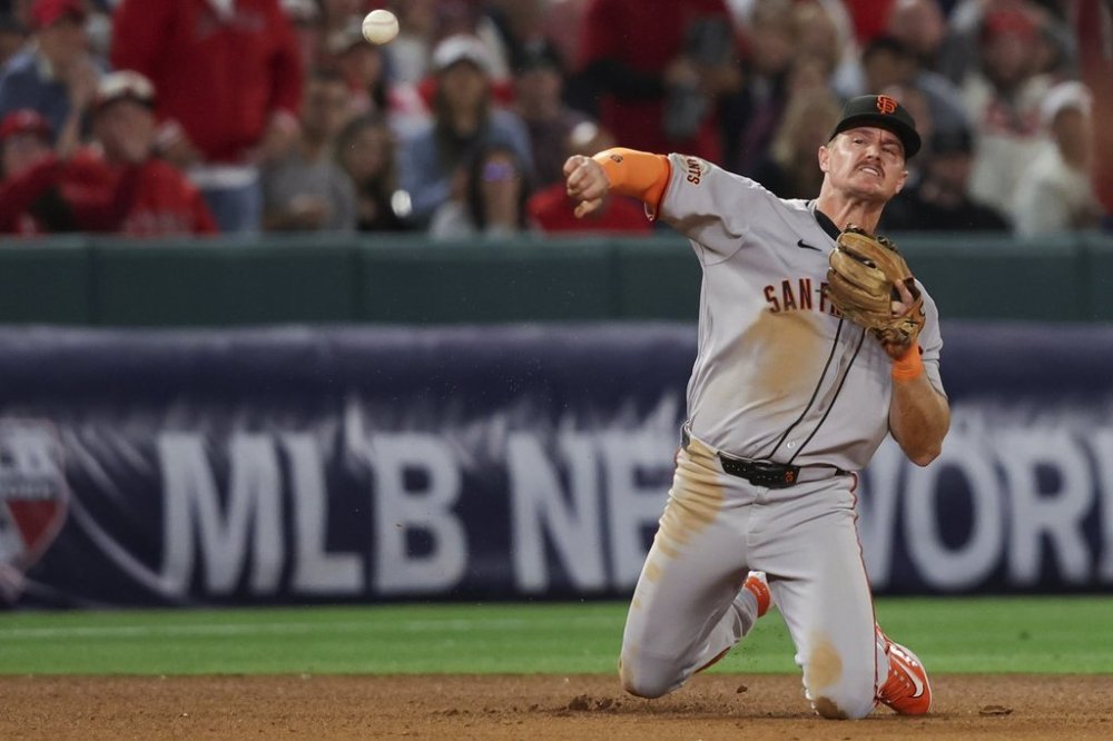 San Francisco Giants third baseman Matt Chapman throws the ball to first base during the ninth inning of a baseball game against the Los Angeles Angels in Anaheim, Calif., Saturday, April 19, 2025. (AP Photo/Jessie Alcheh)
