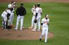 Baltimore Orioles starting pitcher Charlie Morton, front, walks back to the dugout after he was pulled during the third inning of a baseball game against the Cincinnati Reds, Sunday, April 20, 2025, in Baltimore. (AP Photo/Nick Wass)