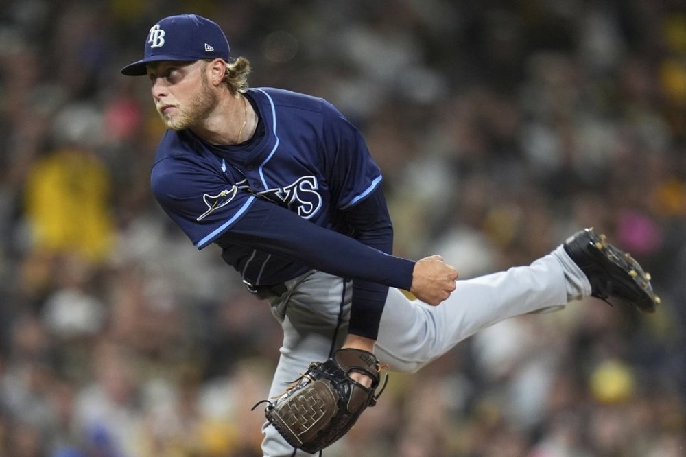 Tampa Bay Rays starting pitcher Shane Baz works against a San Diego Padres batter during the fifth inning of a baseball game Friday, April 25, 2025, in San Diego. (AP Photo/Gregory Bull)