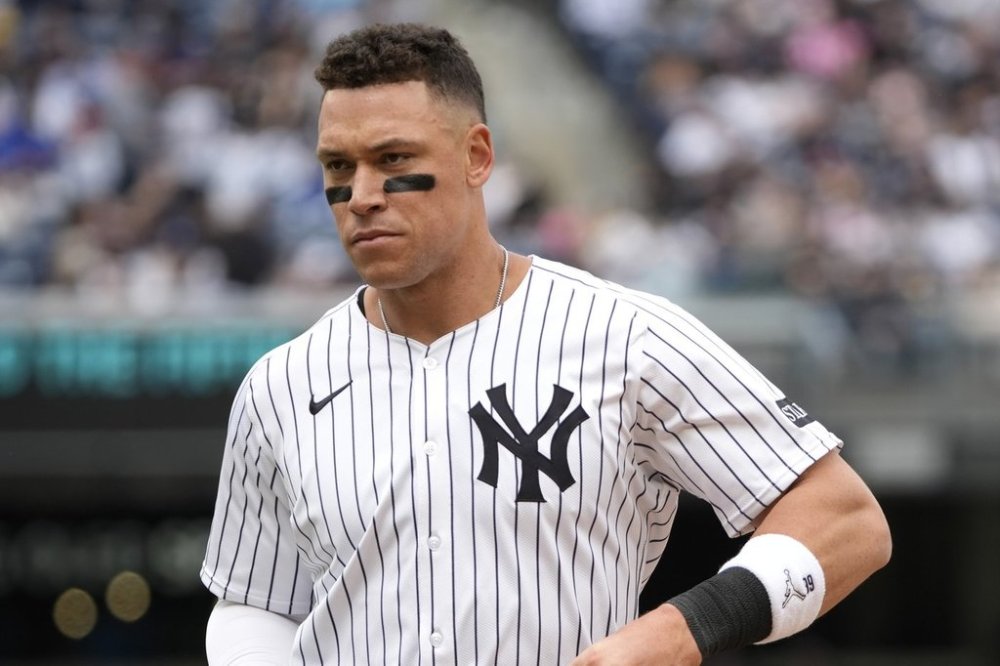 New York Yankees' Aaron Judge walks to the dugout during the fourth inning of the first baseball game of a doubleheader against the Toronto Blue Jays, Sunday, April 27, 2025, in New York. (AP Photo/Pamela Smith)
