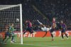 Inter Milan's Denzel Dumfries, third right, scores his side's second goal during the Champions League semifinal first leg soccer match between Barcelona and Inter Milan at the Lluis Companys Olympic Stadium in Barcelona, Spain, Wednesday, April 30, 2025. (AP Photo/Joan Monfort)