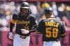 Pittsburgh Pirates' Oneil Cruz (15) rounds third after hitting a solo home run off Washington Nationals pitcher Trevor Williams (32) to lead off the baseball game in Pittsburgh, Thursday, April 17, 2025. (AP Photo/Gene J. Puskar)