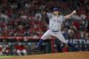 FILE - Texas Rangers relief pitcher Andrew Chafin throws during the seventh inning of a baseball game against the Los Angeles Angels, Friday, Sept. 27, 2024, in Anaheim, Calif. (AP Photo/Ryan Sun, File)