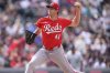 Cincinnati Reds starting pitcher Nick Lodolo works against the Colorado Rockies in the sixth inning of a baseball game Sunday, April 27, 2025, in Denver. (AP Photo/David Zalubowski)