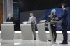 New Democratic Party Leader Jagmeet Singh speaks as Liberal Leader Mark Carney, Bloc Québécois Leader Yves-Francois Blanchet and Conservative Leader Pierre Poilievre look on during the French-language federal leaders' debate in Montreal on Wednesday, April 16, 2025. THE CANADIAN PRESS/Christopher Katsarov