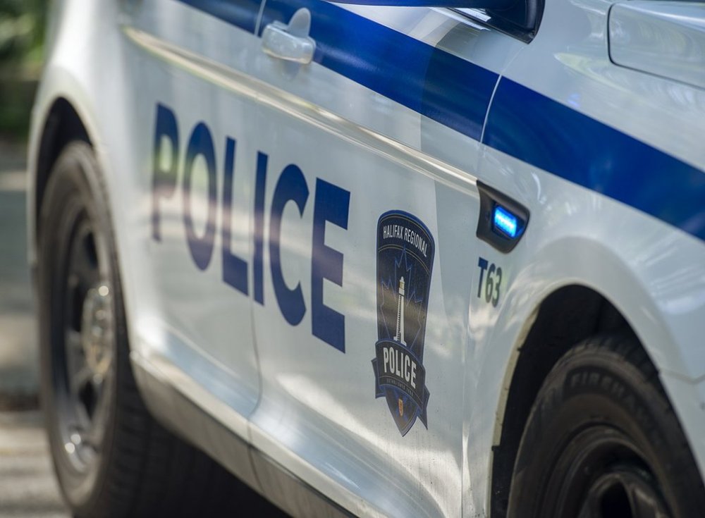 Police officers attend a scene in Halifax, Thursday, July 2, 2020. THE CANADIAN PRESS/Andrew Vaughan