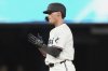 Miami Marlins' Griffin Conine reacts after hitting a double during the seventh inning of a baseball game against the Arizona Diamondbacks, Tuesday, April 15, 2025, in Miami. (AP Photo/Lynne Sladky)