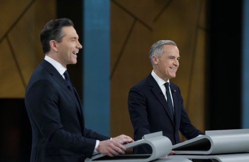 Conservative Leader Pierre Poilievre, left, and Liberal Leader Mark Carney participate in the English-language federal leaders' debate in Montreal on Thursday, April 17, 2025. THE CANADIAN PRESS/Adrian Wyld