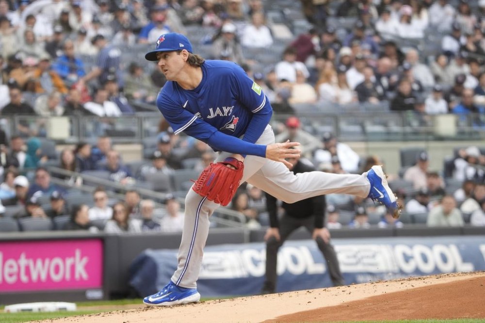 Toronto Blue Jays pitcher Kevin Gausman throws during the first inning of a baseball game against the New York Yankees, Sunday, April 27, 2025, in New York. (AP Photo/Pamela Smith)