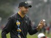 FILE - International Presidents Cup team player Geoff Ogilvy, from Australia, gestures after winning the second hole of his singles match against United States' Steve Stricker at the Presidents Cup at Harding Park Golf Course, Sunday, Oct. 11, 2009, in San Francisco. (AP Photo/Marcio Jose Sanchez, File)