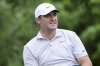 Scottie Scheffler watches his drive on the sixth tee during the first round of the CJ Cup Byron Nelson golf tournament, Thursday, May 1, 2025, in McKinney, Texas. (AP Photo/Gareth Patterson)