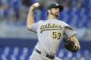 Oakland Athletics starting pitcher Gunnar Hoglund (53) throws during the first inning of a baseball game against the Miami Marlins, Friday, May 2, 2025, in Miami. (AP Photo/Lynne Sladky)