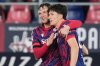 Bologna's Giovanni Fabbian, right, is congratulated Sam Beukema after scoring the opening goal during an Italian Cup semifinal soccer match between Bologna FC and Empoli FC at Renato Dall'Ara Stadium, Thursday, April 24, 2025, Bologna, Italy. (Massimo Paolone/LaPresse via AP)