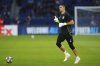 Aston Villa's goalkeeper Emiliano Martinez comes on to the pitch for warmup before the Champions League quarterfinal first leg soccer match between Paris Saint-Germain and Aston Villa at Parc des Princes stadium in Paris, Wednesday, April 9, 2025. (AP Photo/Aurelien Morissard)