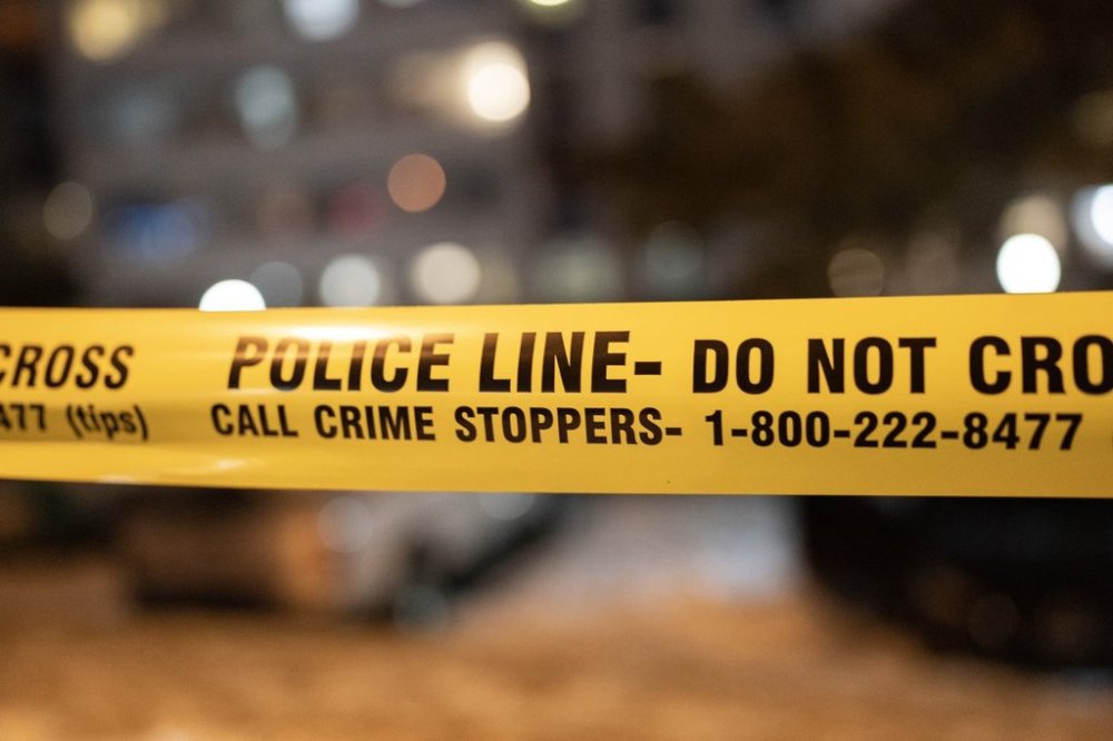Police tape cordons off a crime scene in Toronto on Saturday, Jan. 14, 2023. THE CANADIAN PRESS/Arlyn McAdorey