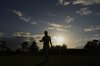 Tom Kim, of South Korea, walks to the tee on the 18th hole during the second round at the Masters golf tournament, Friday, April 11, 2025, in Augusta, Ga. (AP Photo/Matt Slocum)