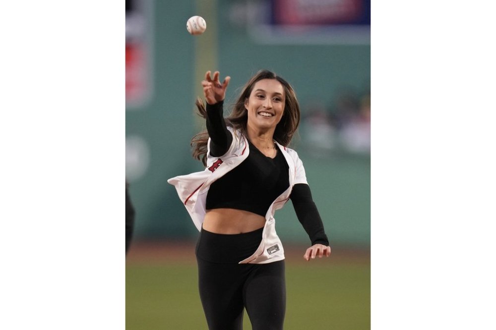 FILE - MIT women's soccer graduate student Karenna Groff throws a ball prior to a baseball game at Fenway Park, Monday, April 3, 2023, in Boston. (AP Photo/Charles Krupa, File)