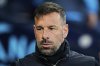 Leicester's head coach Ruud van Nistelrooy during the English Premier League soccer match between Manchester City and Leicester City at the Etihad stadium in Manchester, England, Wednesday, April 2, 2025. (AP Photo/Dave Thompson)